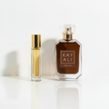 Kayali Vanilla 28 with gold sample vial on white background